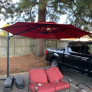 Selling patio umbrella. With lights! Good condition.